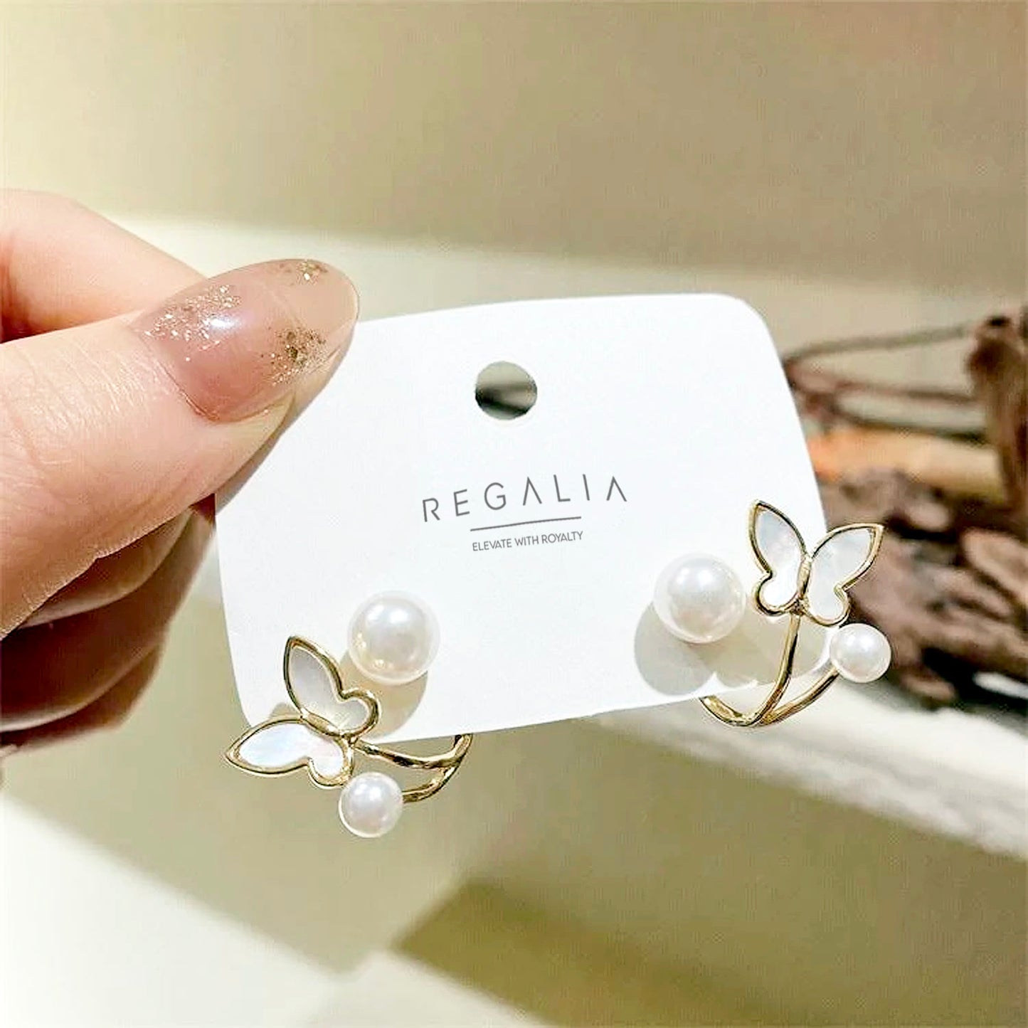 REGALIA BUTTERFLY PEARL EARRING