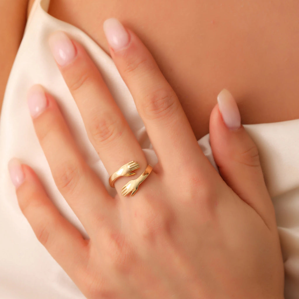 HOLDING HAND RING